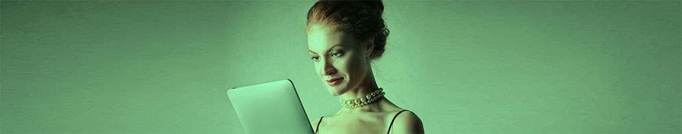 Image: Woman reading news on a Tablet